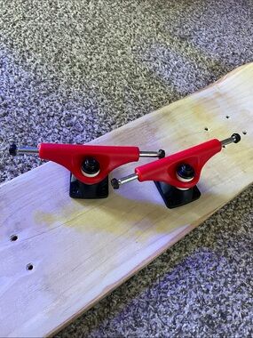 Red Skateboard Trucks